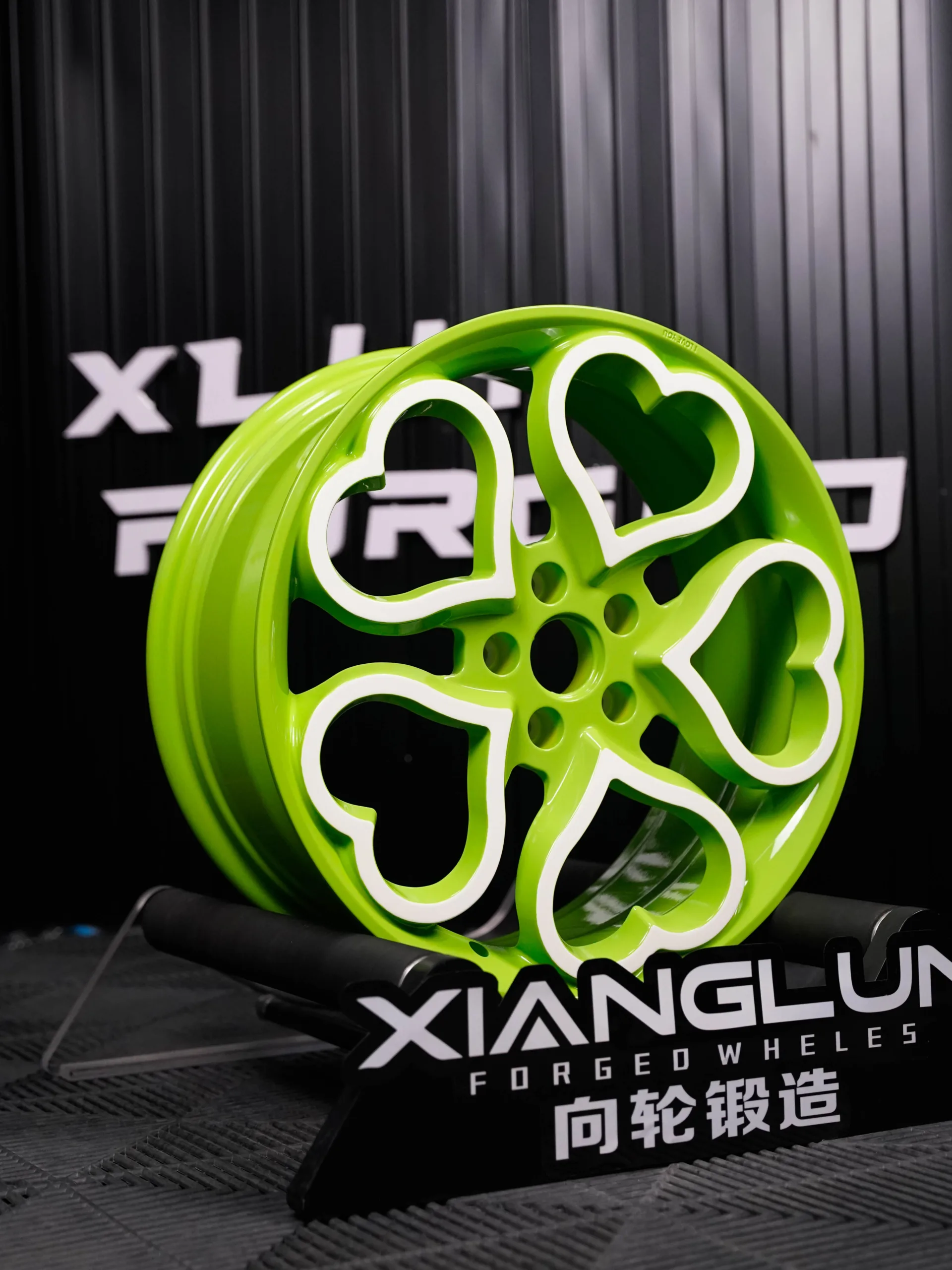 Custom forged green heart-shaped wheels