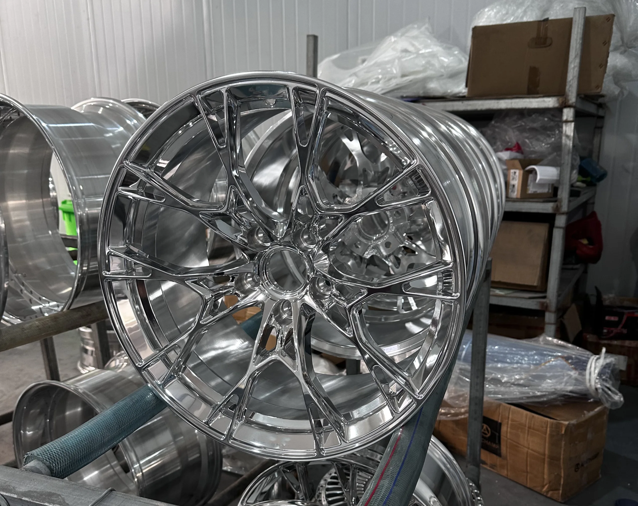 Polished forged wheels boast bright reflective surfaces that highlight intricate design details (1)