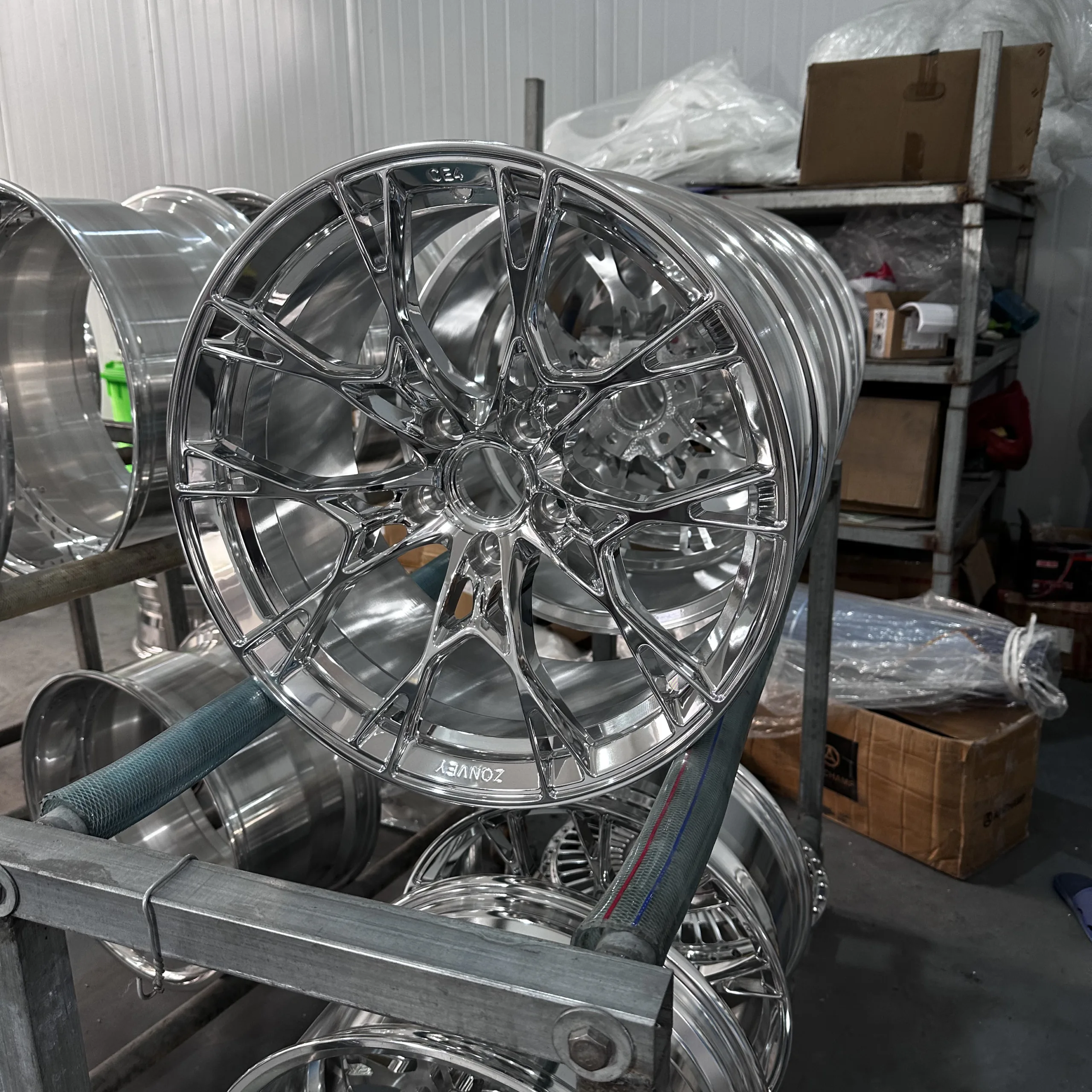 Polished forged wheels boast bright reflective surfaces that highlight intricate design details (1)