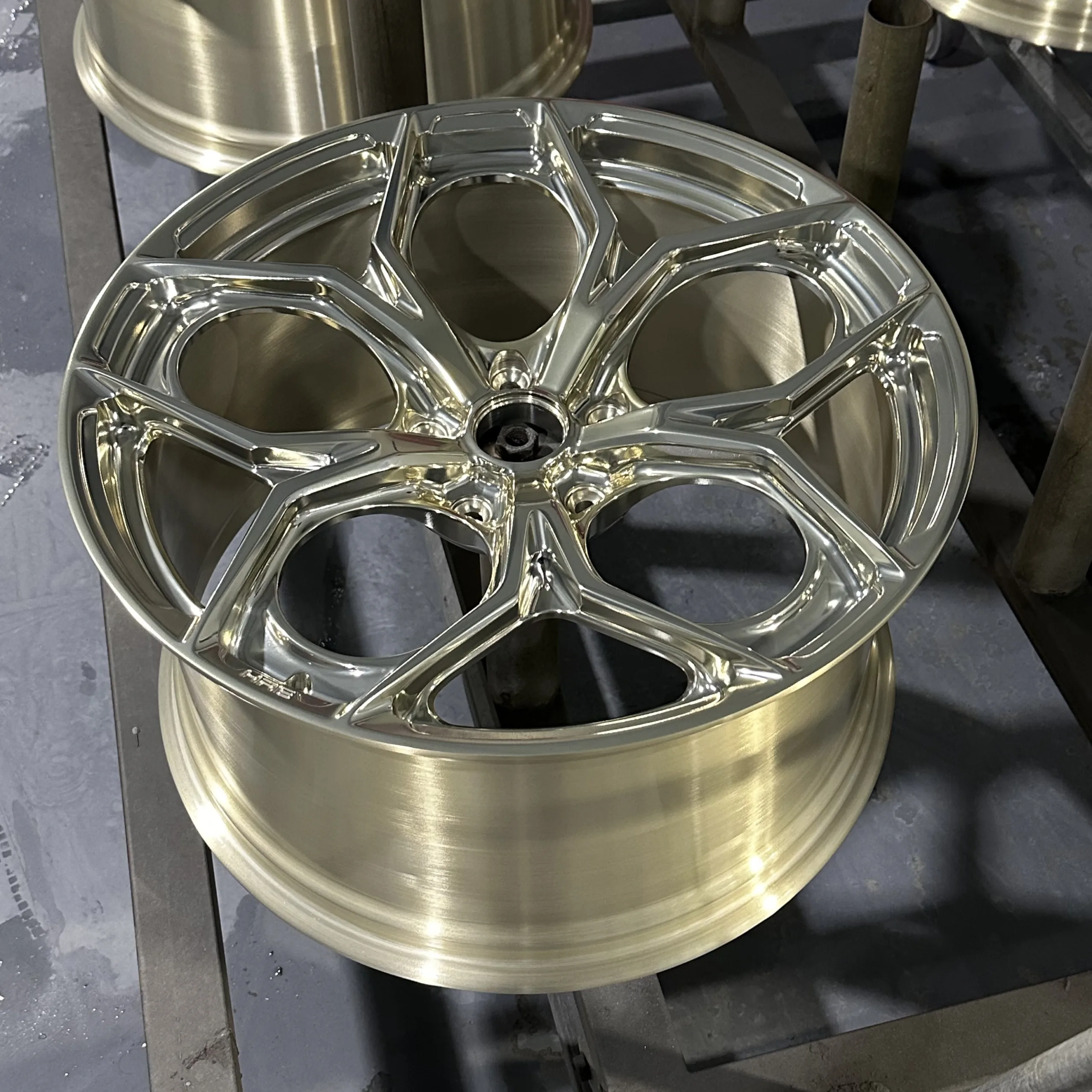Polished forged wheels boast bright reflective surfaces that highlight intricate design details (3)